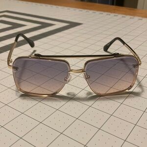 Tinted gold rim glasses